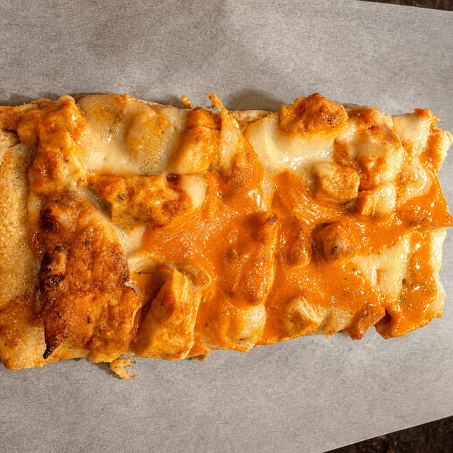 Buffalo Chicken Pizza Slice.